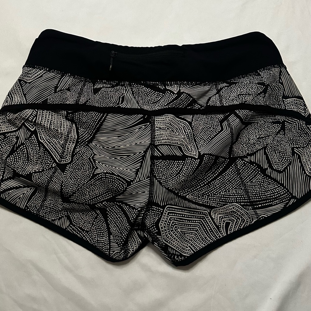 Black and white Lululemon shorts with built-in underwear